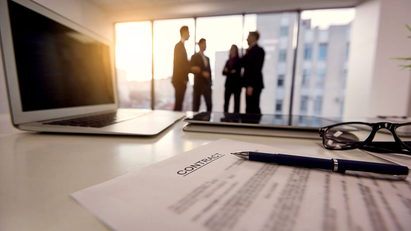 People standing in an office.